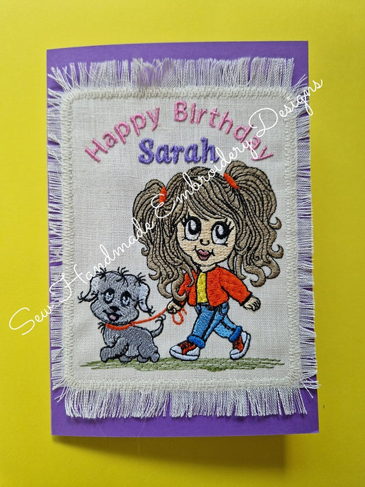 Machine embroidery birthday card with a girl and dog design on a yellow background
